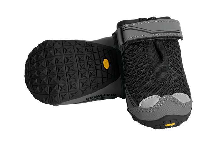A pair of Ruffwear Grip Trex dog boots with textured outsoles.