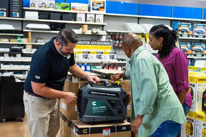 Salesperson showing a Cummins Onan generator
