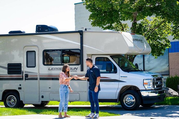Renter saying goodbye to RV owner before setting out on an adventure
