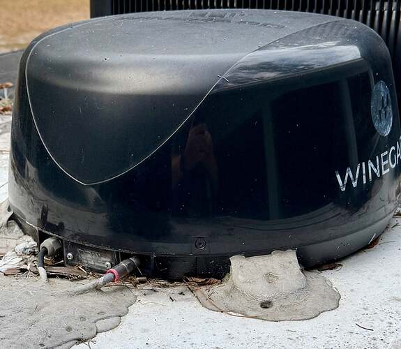 The Winegard ConnecT 2.0+ Antenna. Note the clear plastic SIM Card plate at the base of the antenna.