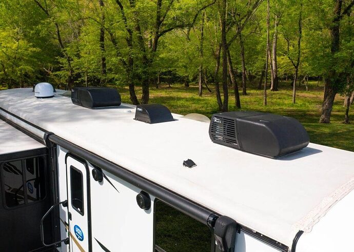 dual air conditioners on top of rv roof
