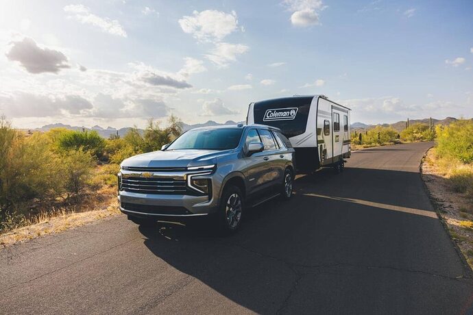 large SUV towing Coleman Legacy camper