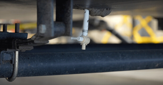 rv fresh water tank drain valve location underneath coach