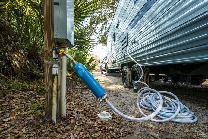Checking water hookup outside RV for RV shakedown trip