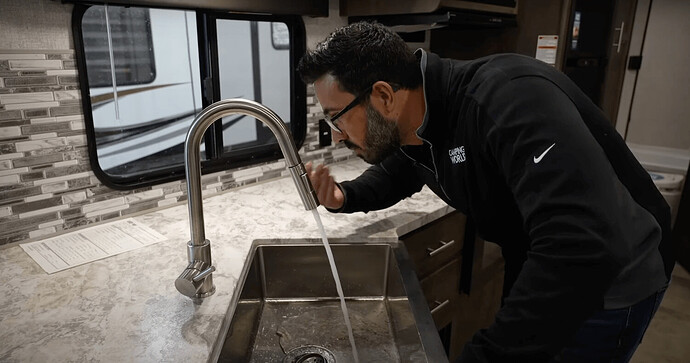flushing rv fresh water system through faucets to remove bleach smell