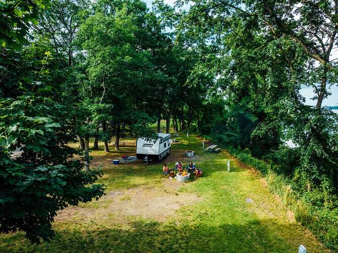 Shaded campsites are great when learning how to keep RV cool in summer