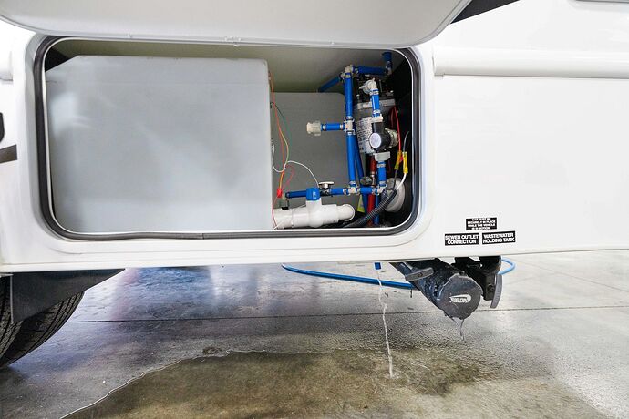 opening rv fresh water tank low-point drain valve after sanitization