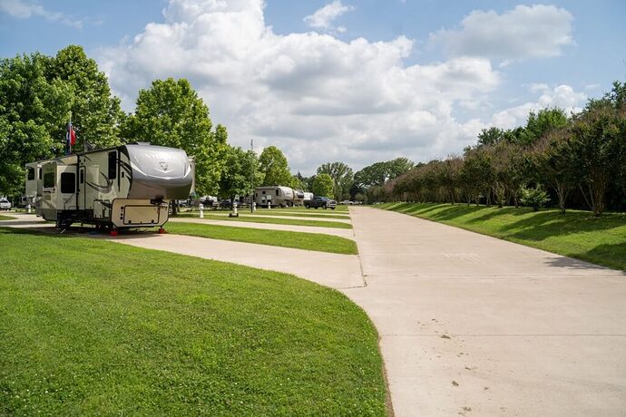 Grassy campground with RV driveways