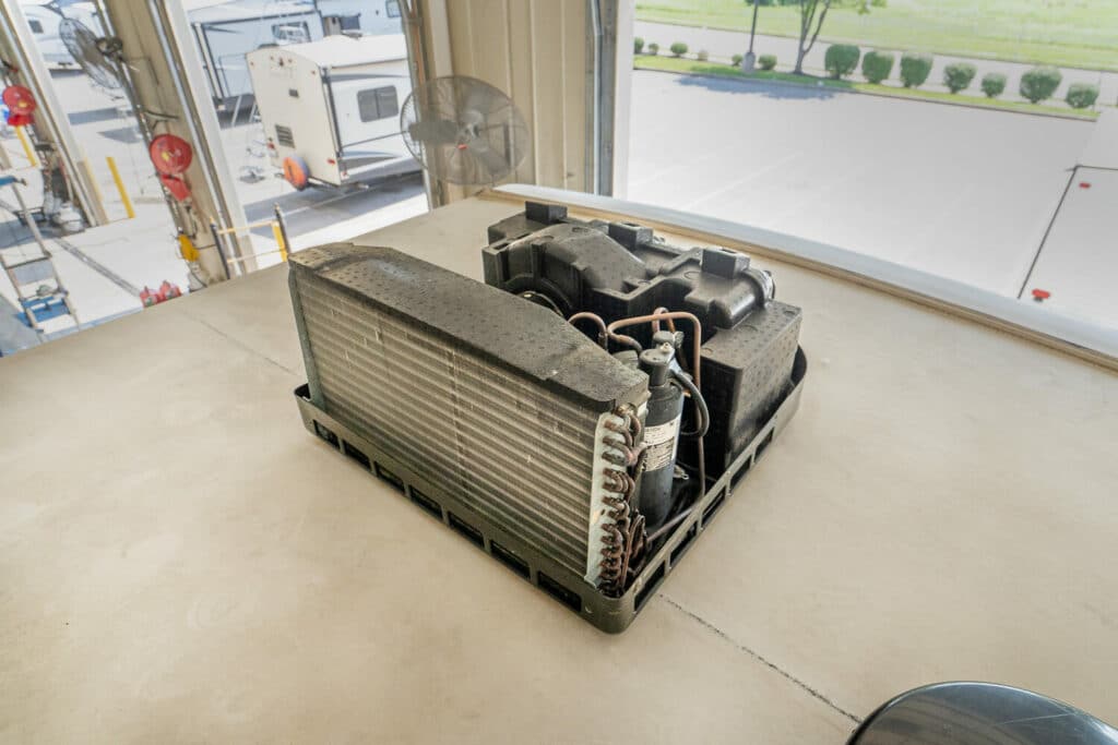 RV air conditioner from the back with shroud removed